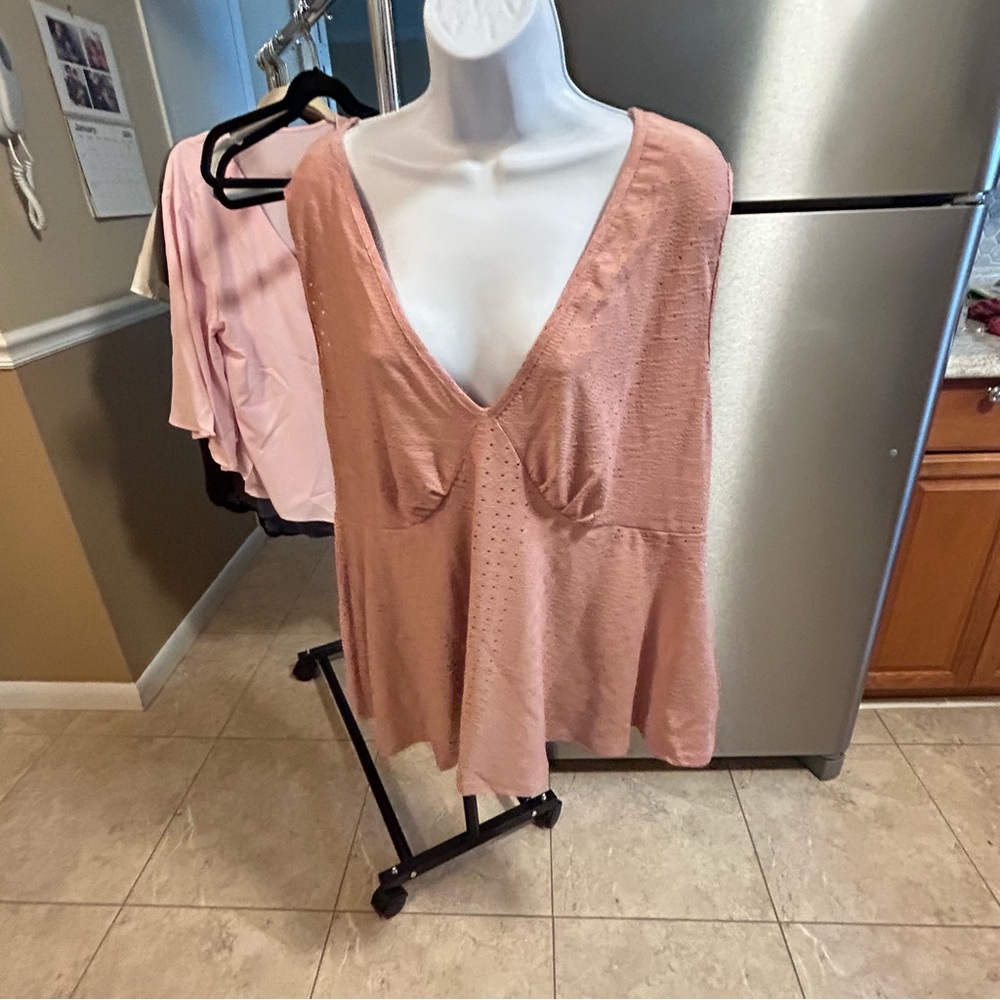 Women’s rose colored top